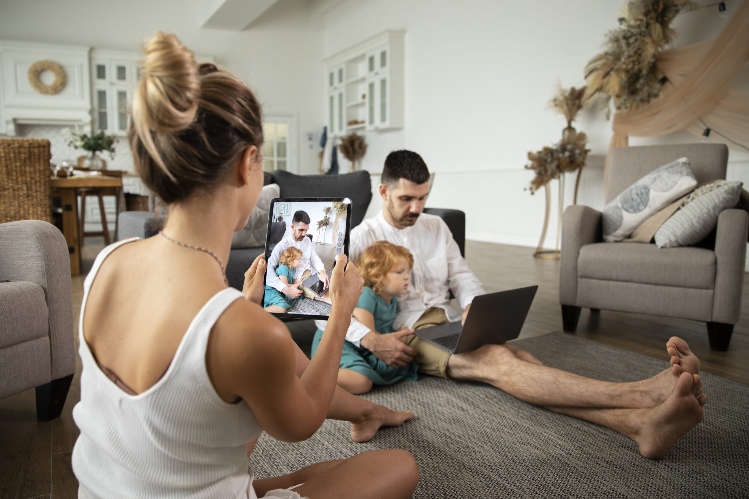 medium-shot-mother-taking-photos-family